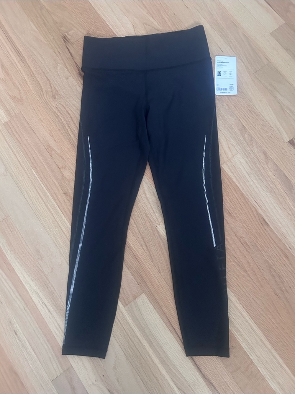 Athleta Black High-Waist Leggings with Reflective Side Trim